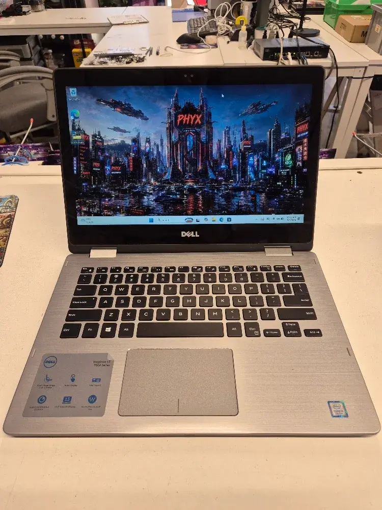 Dell Inspiron 13-7378 touchscreen 2-in-1 laptop, main product photo showing the open laptop.