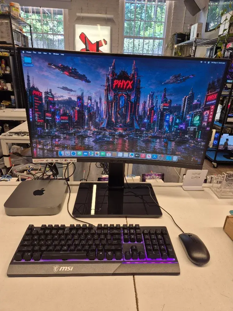Apple Mac mini 2018 desktop computer, main view of the aluminium enclosure, sold by PHYX