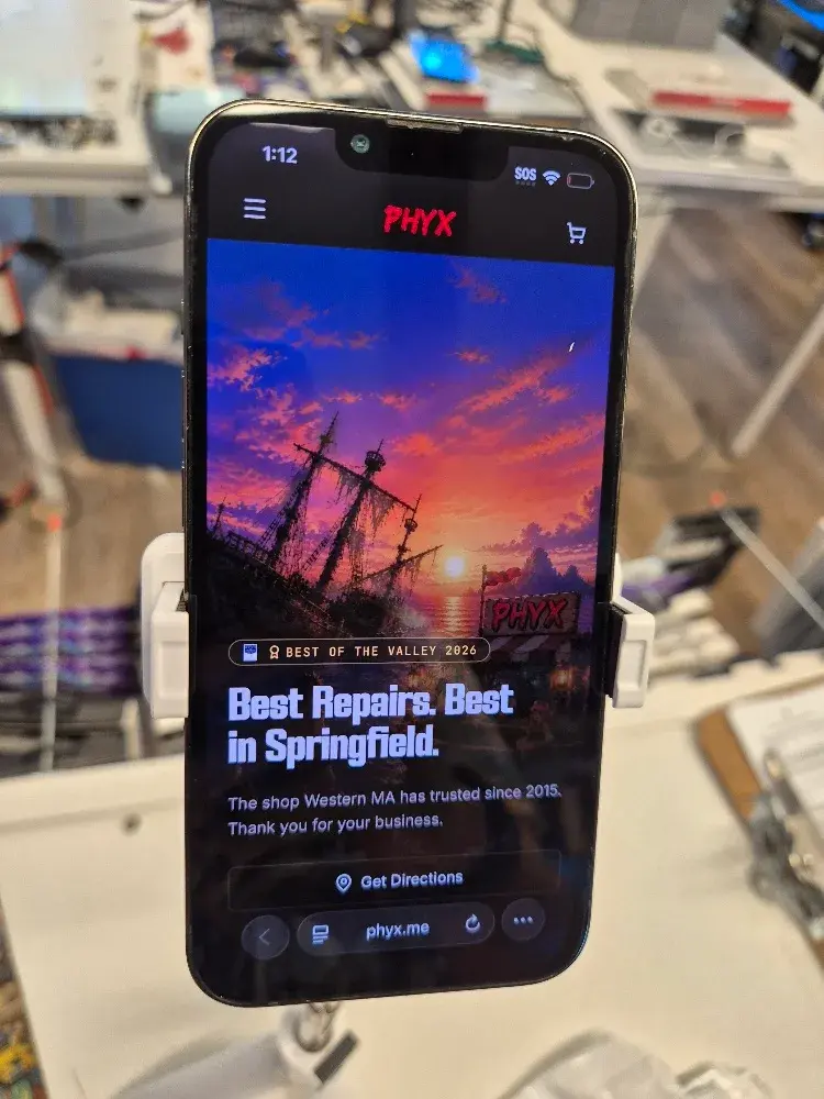 Apple iPhone 13 Pro, carrier unlocked with a new battery, main view of the 6.1 inch phone, sold by PHYX