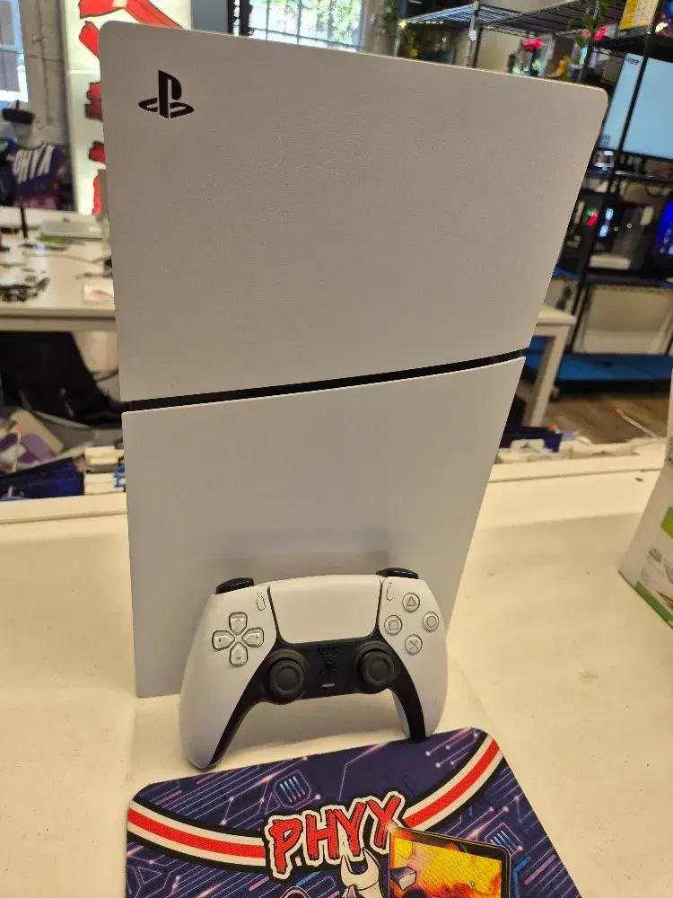 667GB PlayStation 5 Slim Digital console with controller, view 1 of 5