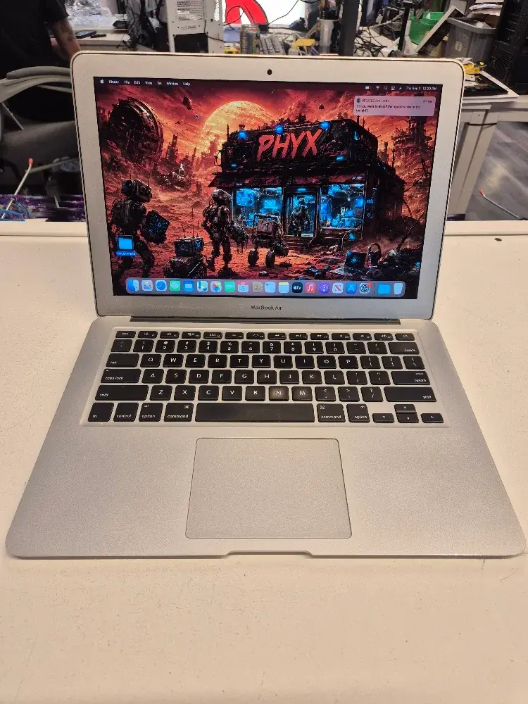 Apple MacBook Air 2014 13 inch laptop with a new battery, main view of the open laptop, sold by PHYX