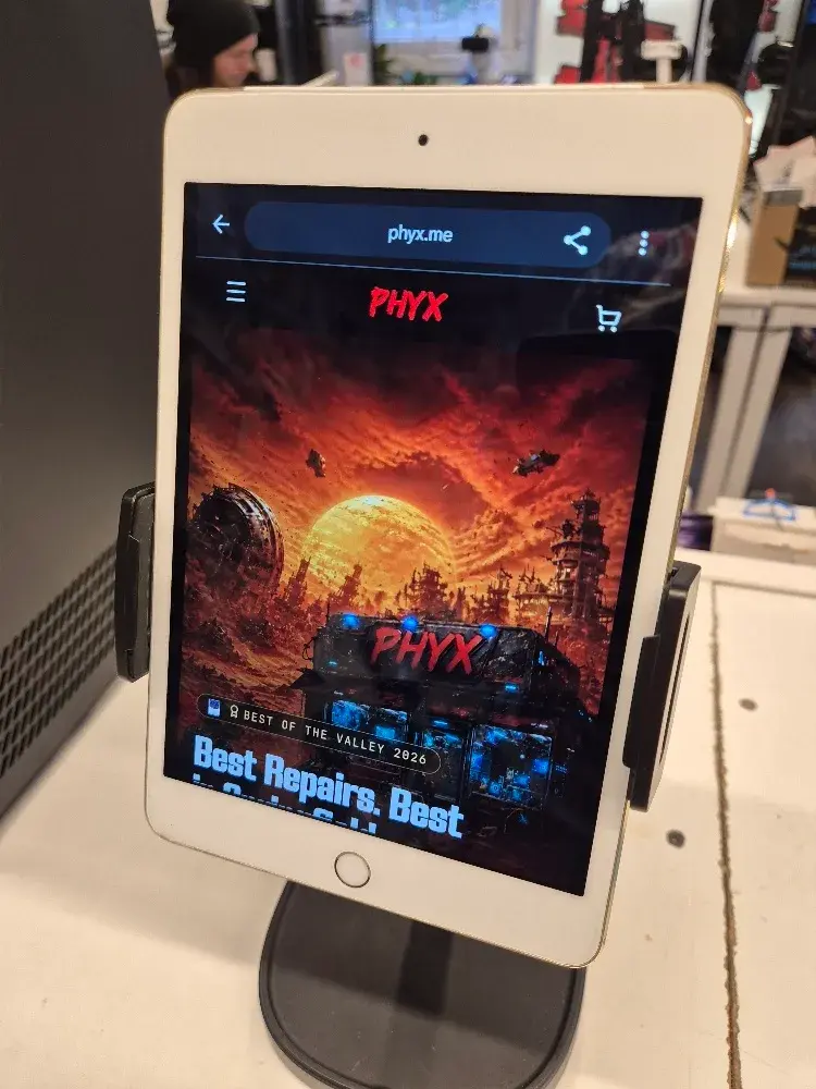 Apple iPad Mini 4 with 128GB storage, Wi-Fi and cellular tablet with a new battery, used condition, view 1 of 4