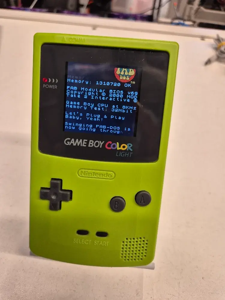 Nintendo Game Boy Color green handheld console, view 1 of 6