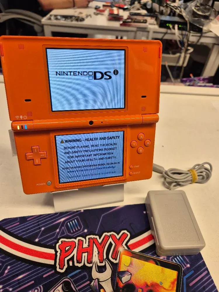 Nintendo DSi orange console bundle, view 1 of 6