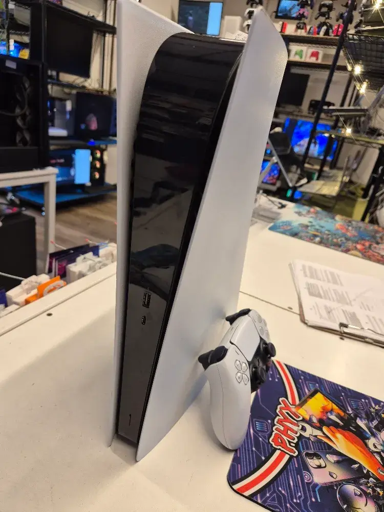 PlayStation 5 Digital console with controller, view 1 of 5
