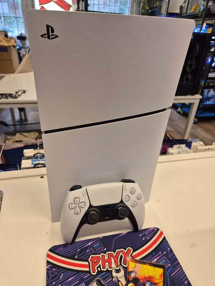 PlayStation 5 Slim Digital console with controller, view 1 of 5