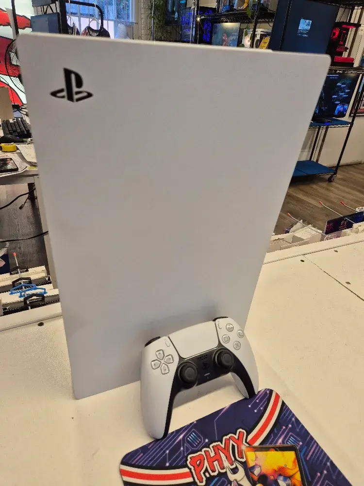 667GB PlayStation 5 Disc console with controller, view 1 of 5