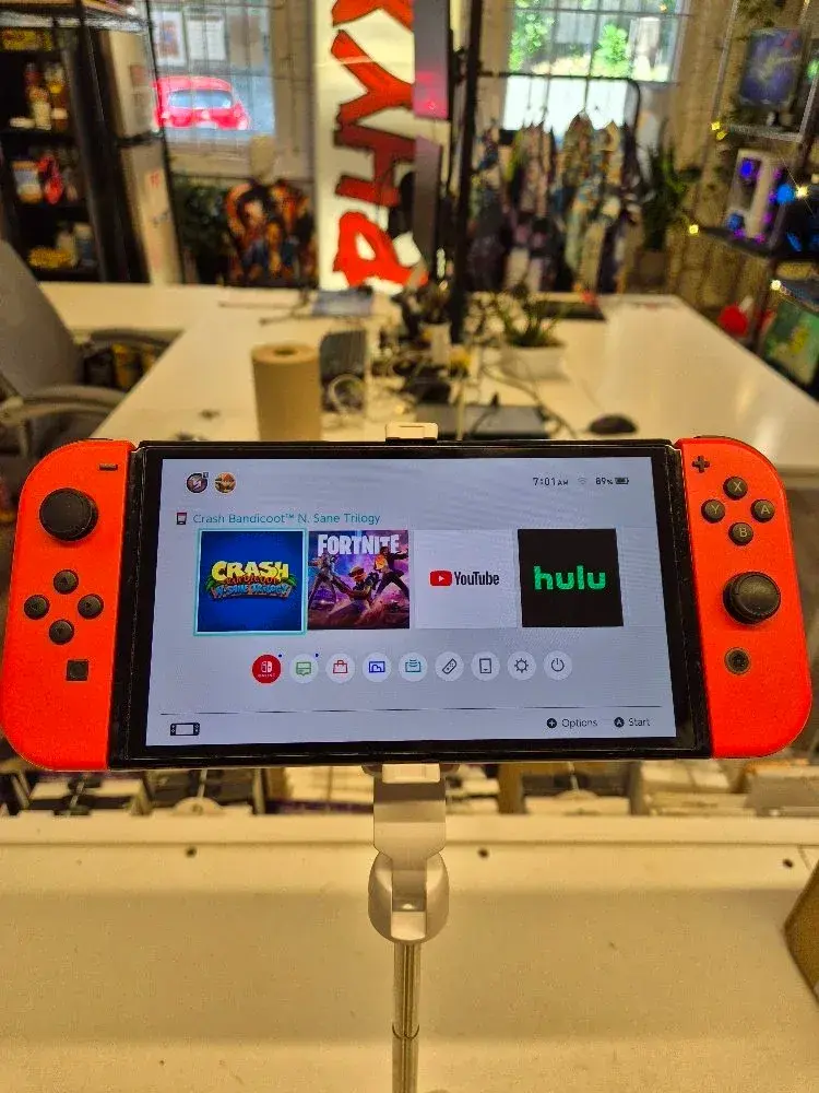 Nintendo Switch – OLED Model w/Red Joy-Con XTW50567505036