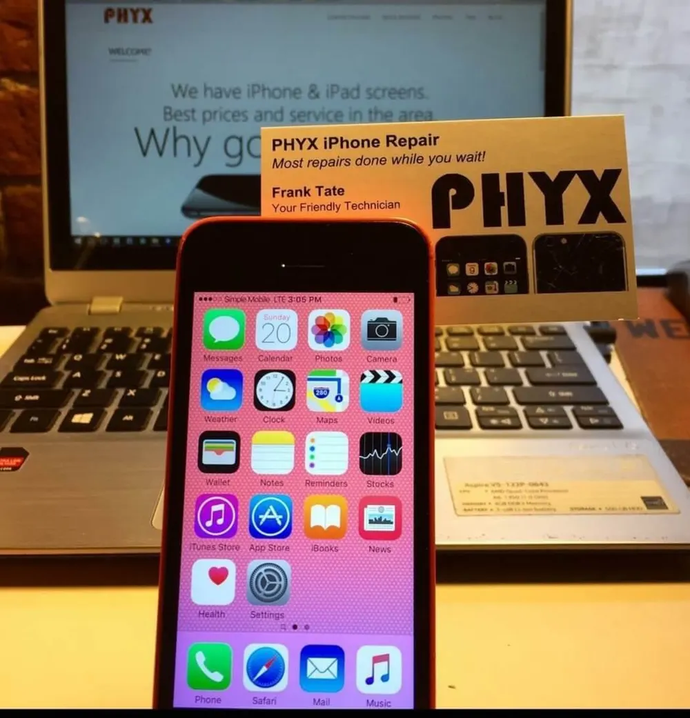 A pink iPhone on the PHYX workbench in the early days