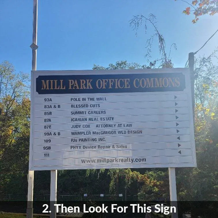 Step 2 — then look for this sign: the Mill Park Office Commons directory board listing PHYX Device Repair & Sales at 95B