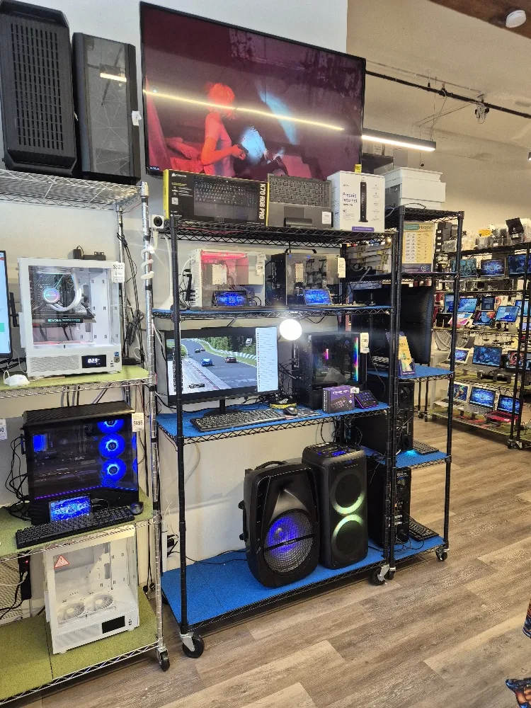 Inside PHYX — devices and consoles stocked in the Mill Park Office Commons